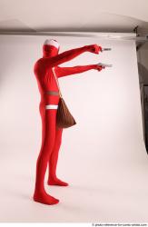 JOEL_ADAMSON CHRISTMAS VILLAIN WITH TWO GUNS